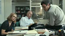 Spotlight team Sacha Pfeiffer, Walter 'Robby' Robinson and Mike Rezendes listen to the voice of Richard Jenkins as Richard Sipe